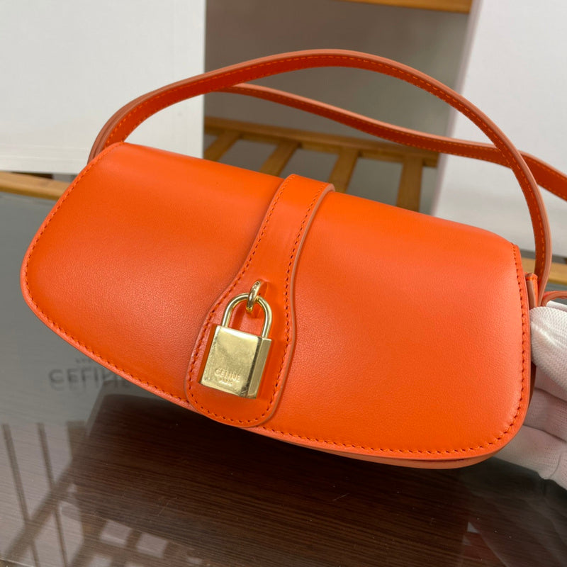 Side profile of modern refined women's handbag – women's luxury accessory