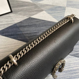 Styled lifestyle shot of statement signature women's handbag – women's statement bag