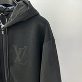 Full styled look of Louis Vuitton luxury clothing with label-forward styling