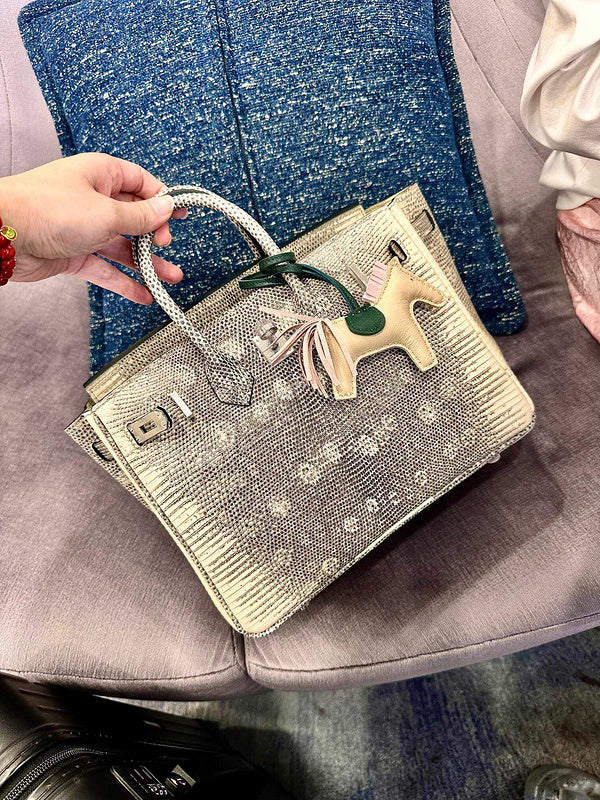 Side view of understated structured handbag