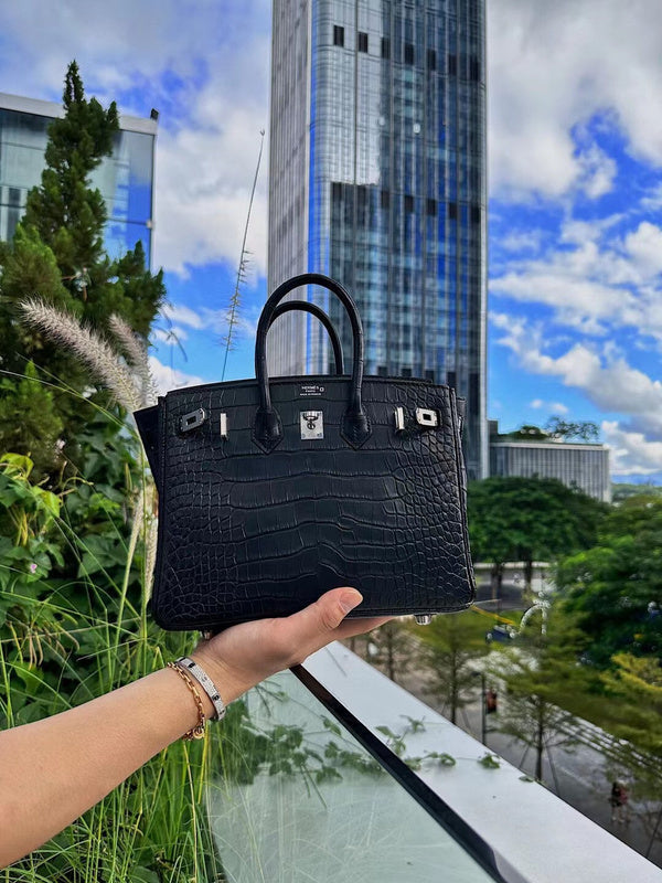 Sculpted handbag styled for everyday wear
