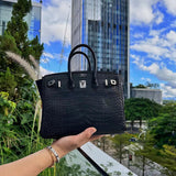 Sculpted handbag styled for everyday wear