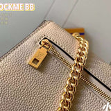 Handle and strap detail of refined chic women's handbag – women's luxury accessory