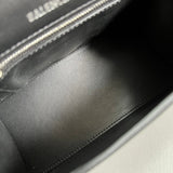 Side profile of structured modern women's handbag – women's premium purse