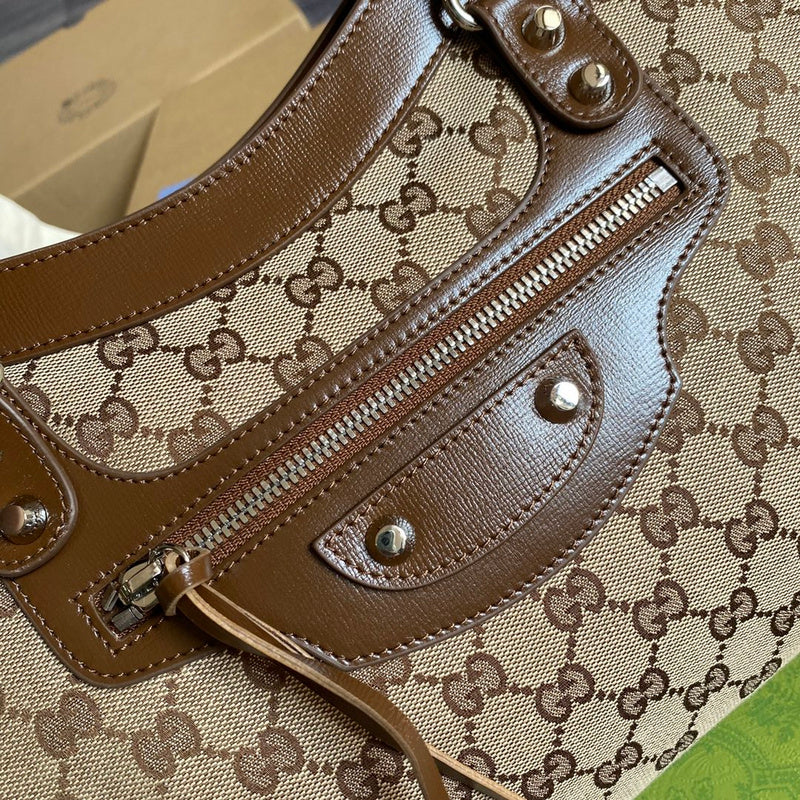 Side profile of polished refined women's handbag – women's luxury handbag