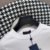Flat lay presentation of Louis Vuitton cotton t-shirt with tailored silhouette
