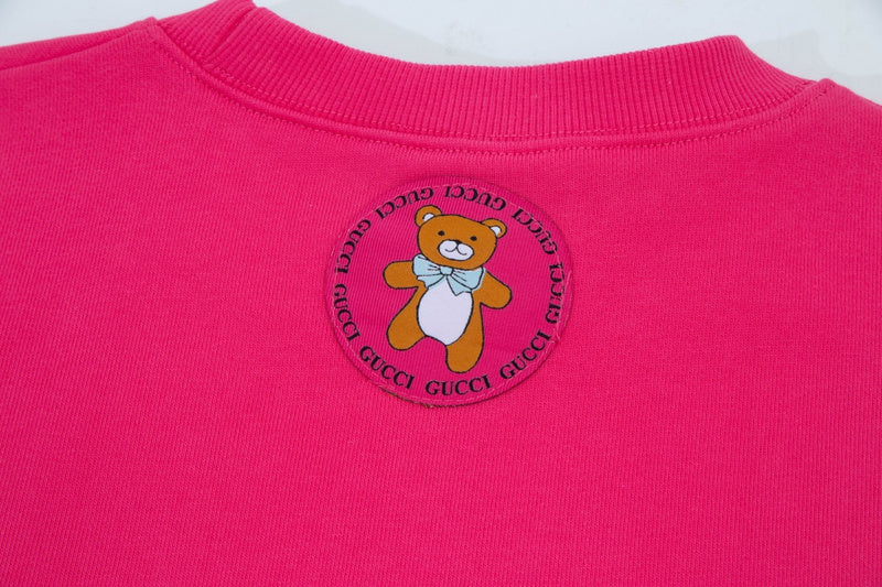 Front view of Gucci luxury clothing with everyday silhouette