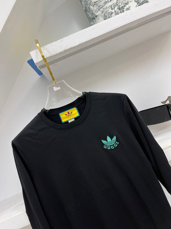 Full styled look of Gucci luxury clothing with logo-detail design