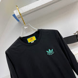 Full styled look of Gucci luxury clothing with logo-detail design