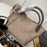 Side profile of premium classic women's handbag – women's luxury accessory