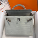 Side view of structured structured handbag