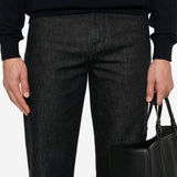 Close-up of Fendi pants hardware and fine stitching