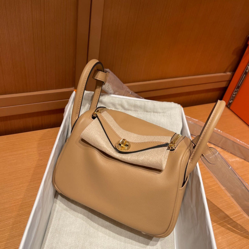 Fluid bag women's premium everyday handbag
