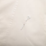 Side profile of Louis Vuitton luxury clothing with logo-detail design