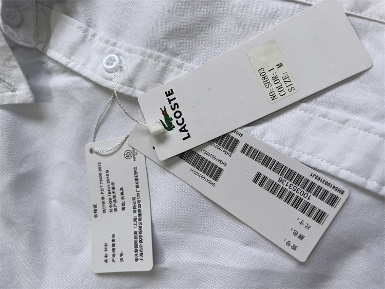 Close-up detail shot of Lacoste luxury clothing with logo-detail design