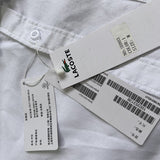 Close-up detail shot of Lacoste luxury clothing with logo-detail design