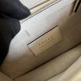 Side profile of signature everyday-luxe women's handbag – women's luxury handbag