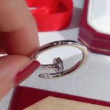 Front view of Cartier unisex jewelry piece