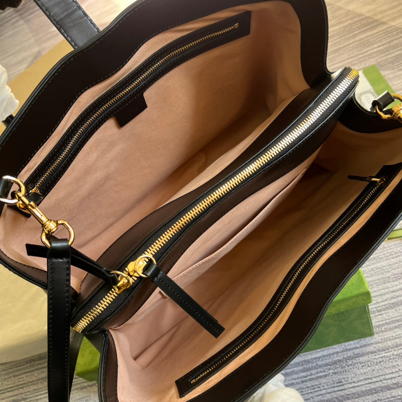 Side profile of structured everyday-luxe women's handbag – women's designer-style accessory