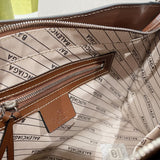 Ziva's Charm handbag – styled view (one versatile size)