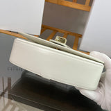Side profile of sleek statement women's handbag – women's luxury handbag
