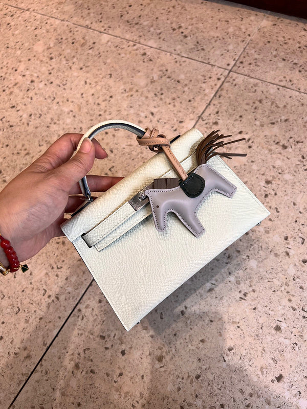 Side view of polished structured handbag