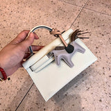 Side view of polished structured handbag
