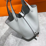 Side view of streamlined structured handbag