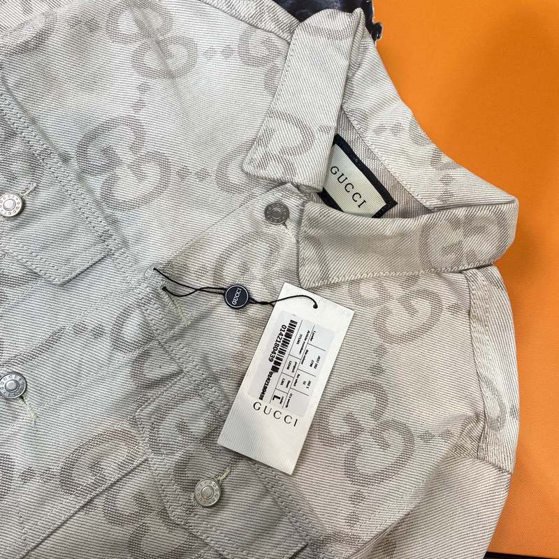Front view of Gucci luxury clothing with logo-detail design
