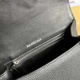 Close-up detail of structured modern women's handbag – women's premium purse