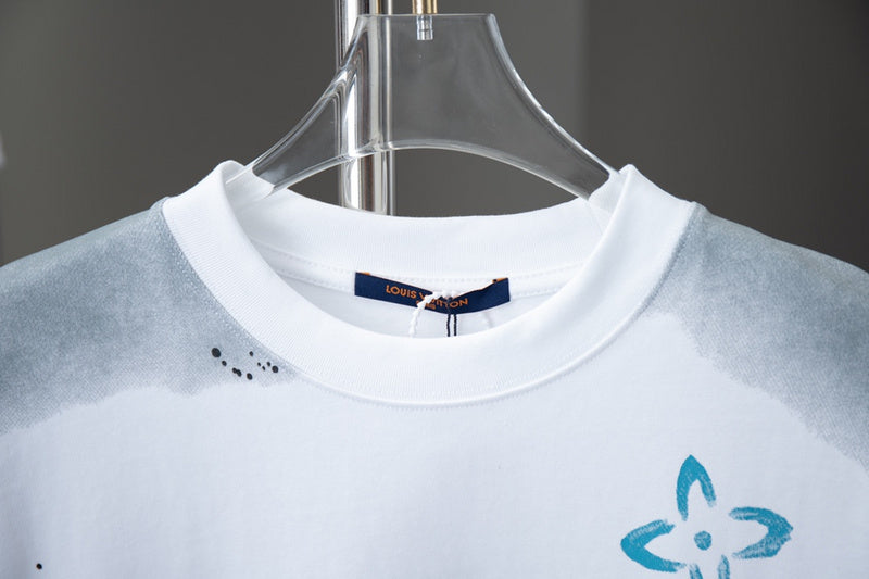 Close-up detail shot of Louis Vuitton cotton t-shirt with monogram-inspired silhouette