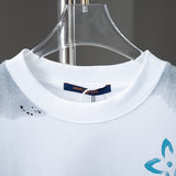 Close-up detail shot of Louis Vuitton cotton t-shirt with monogram-inspired silhouette
