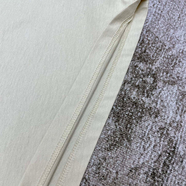 Three-quarter angle view of Amiri luxury piece style No.036