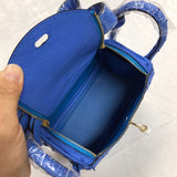 Side view of curated structured handbag