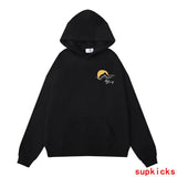 Back view of Rhude luxury clothing with signature branding