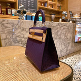 Side view of classic structured handbag