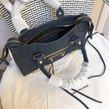 Side profile of elevated refined women's handbag – women's premium purse