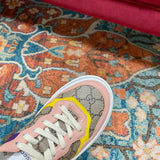Gucci crisp white luxury sneakers view 7 retro runner design