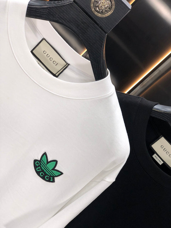 Flat lay presentation of Gucci luxury clothing with streetwear-inspired cut