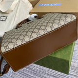 Front view of signature polished women's handbag – women's designer-style accessory