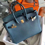 Side view of poised structured handbag