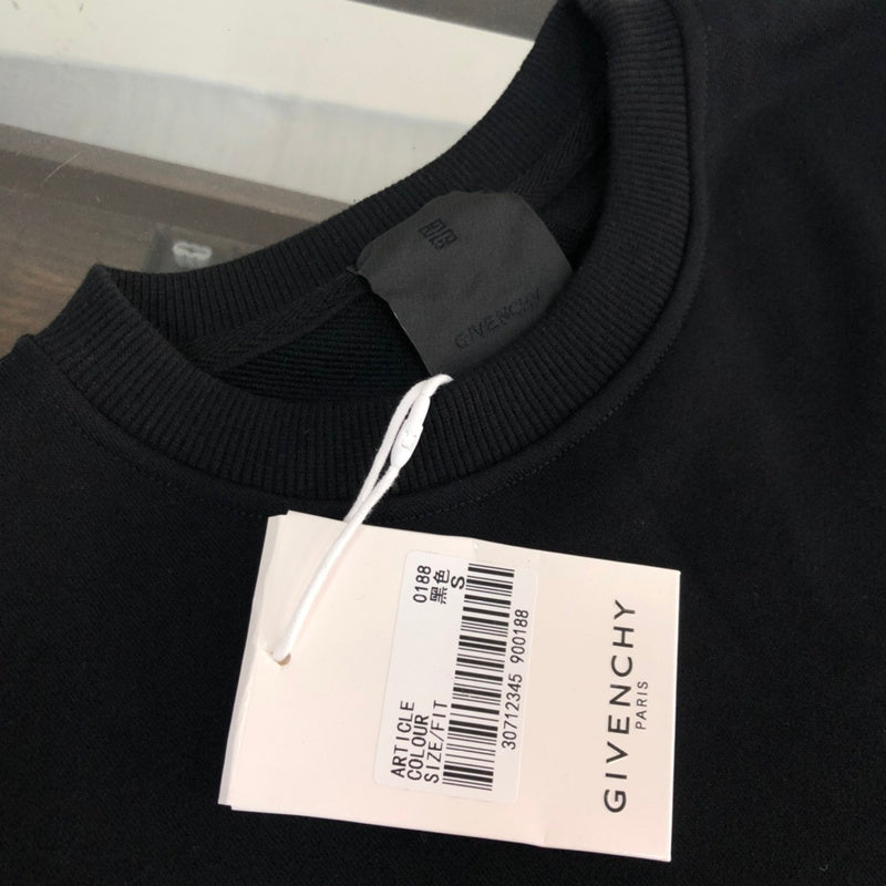 Full styled look of Givenchy luxury clothing with relaxed-fit cut
