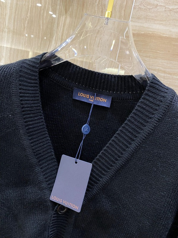Full styled look of Louis Vuitton luxury clothing with monogram-inspired silhouette