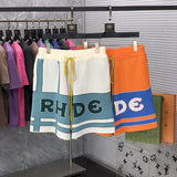 Close-up detail shot of Rhude luxury clothing with relaxed-fit cut