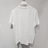 Full styled look of Lacoste luxury clothing with signature branding