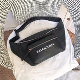 Front view of refined sleek women's handbag – women's luxury accessory