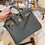  Sleek shopper bag carried on shoulder