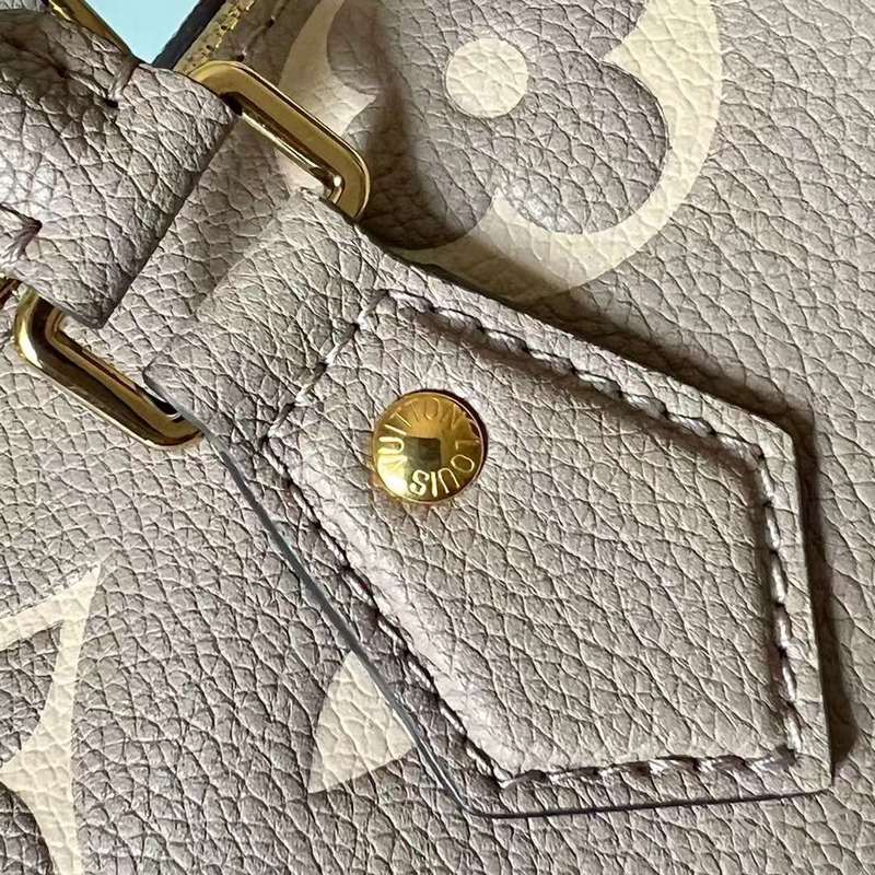 Back view of signature polished women's handbag – women's everyday handbag