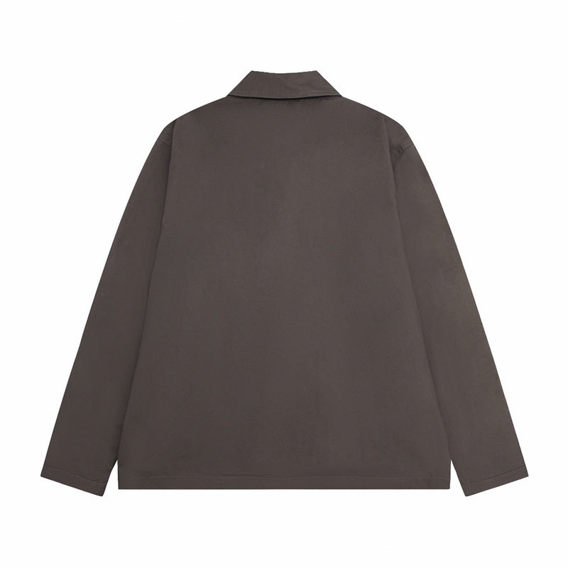 Close-up detail shot of Louis Vuitton luxury clothing with contemporary cut