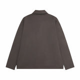 Close-up detail shot of Louis Vuitton luxury clothing with contemporary cut